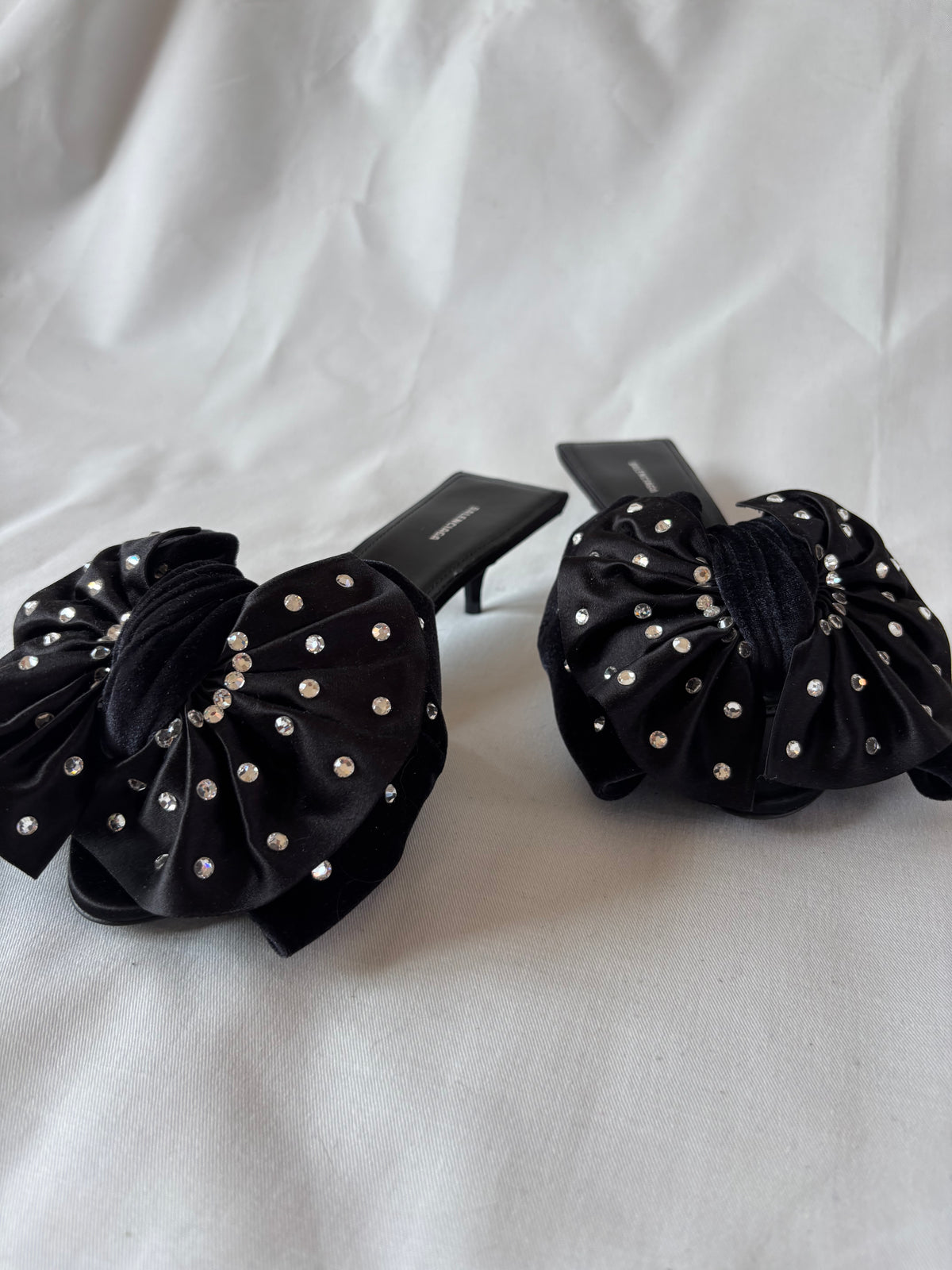 Balenciaga black leather mules with rhinestone bow - 37.5
